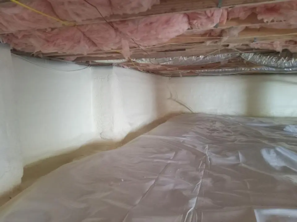 Crawl space encapsulation with closed-cell spray foam for Commercial Roof Restoration in Russellville